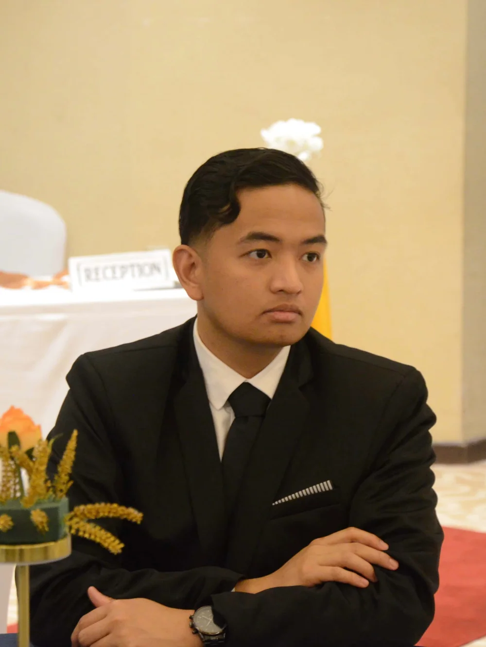 Aaron John Domingo in a suit